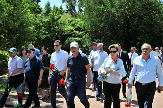 Участники памятной акции в Змиевской балке присоединились к Минуте молчания