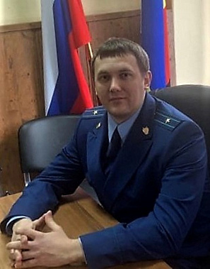 На фото: младший советник юстиции Вадим Василенок